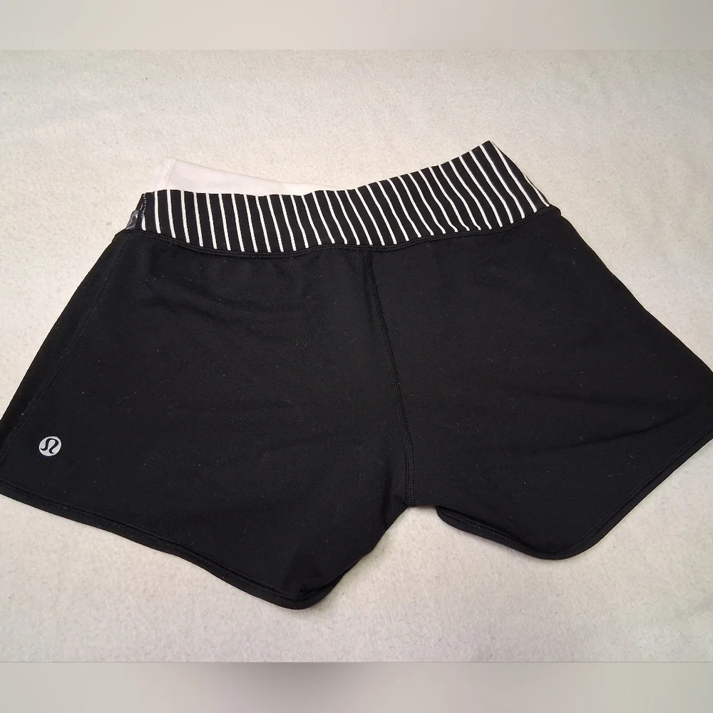 Lululemon Black Athletic Shorts with Floral Waistband - Picture 2 of 4